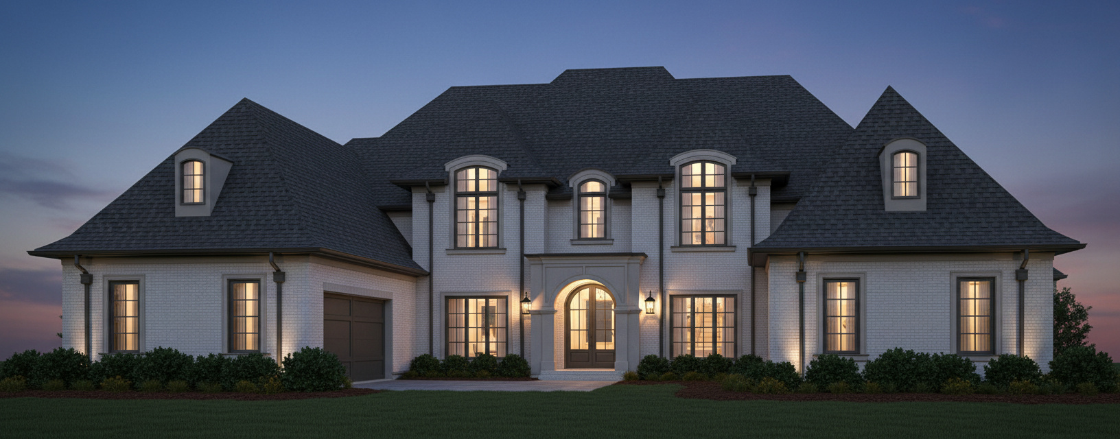 Front elevation of the first residence at dusk.